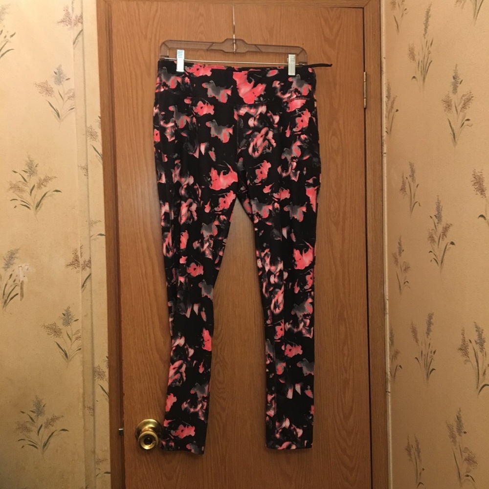 Pink and black yoga pants